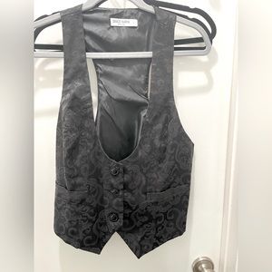 Black vest with floral design